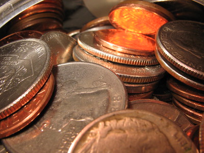 Photo of coins and money.